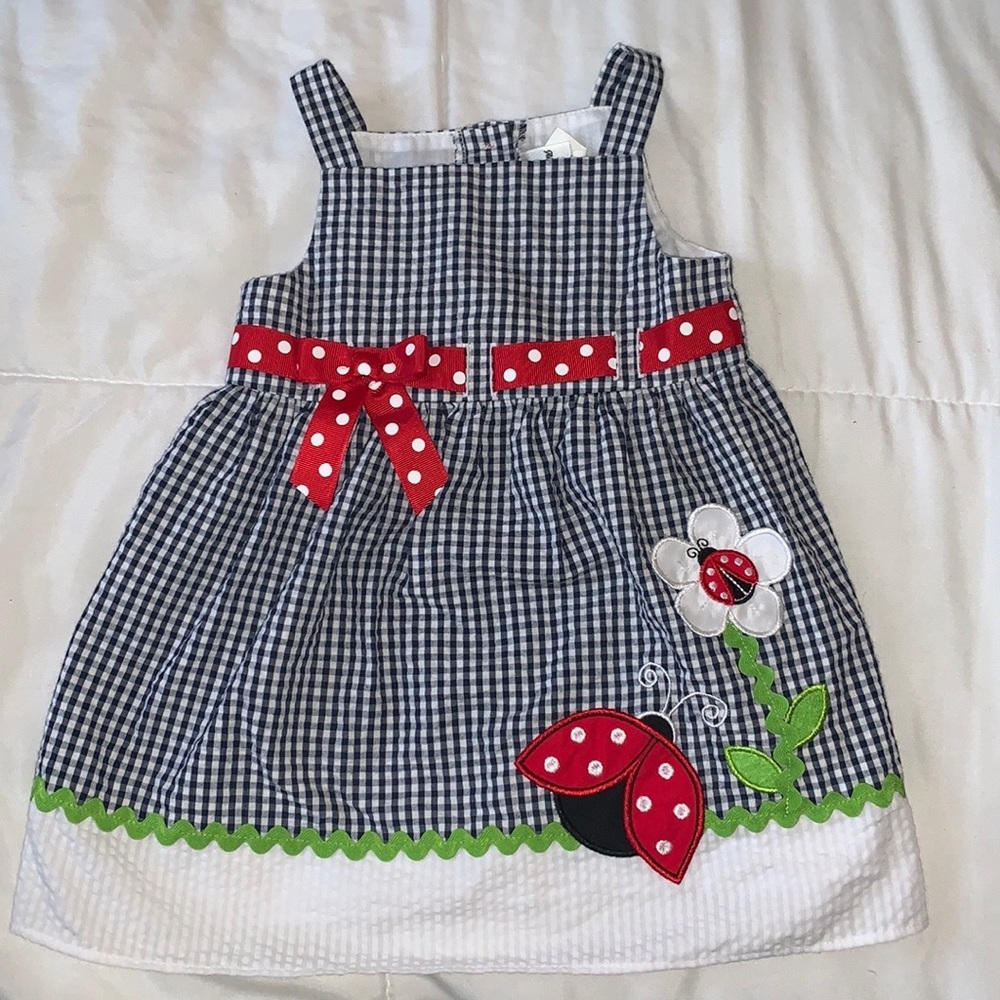 12m girl 4 item lot, bathing suit, 2 dresses and romper